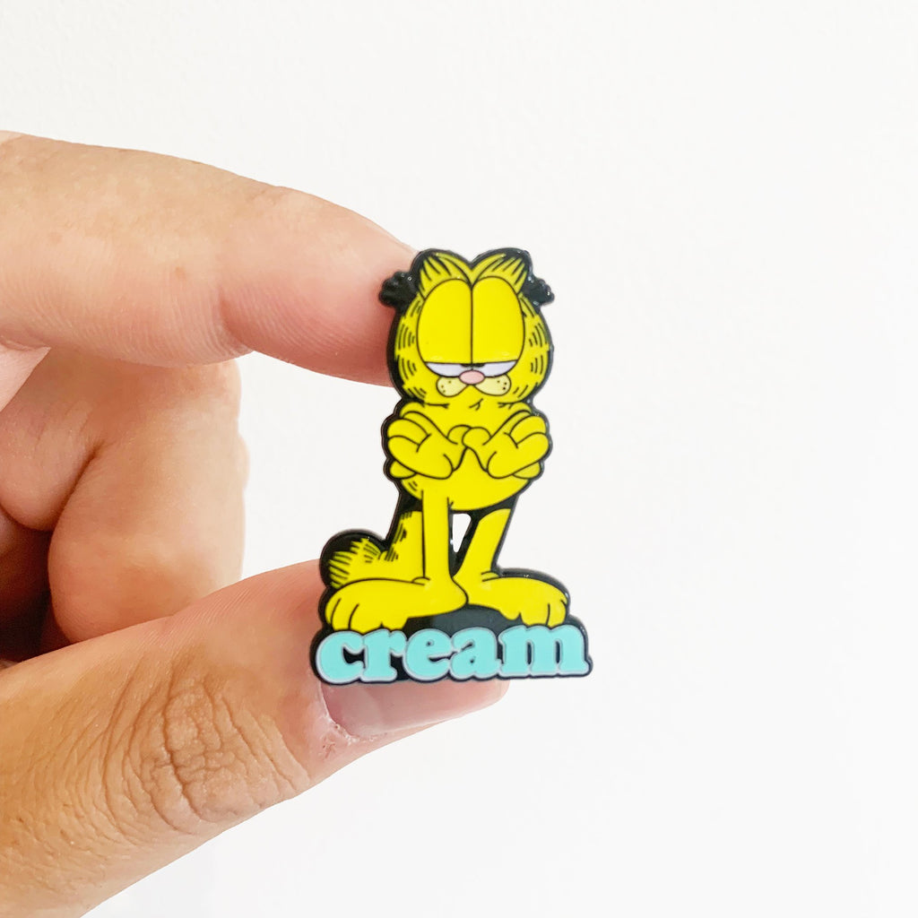 CREAM pin badge
